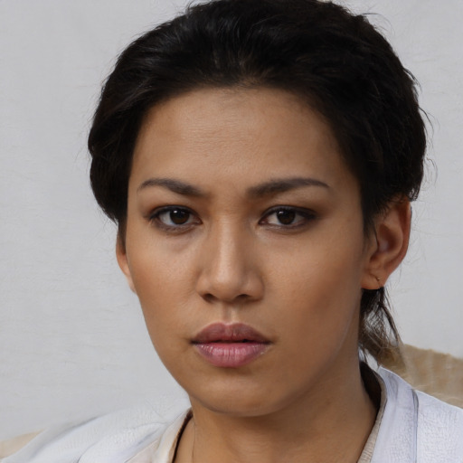 Neutral asian young-adult female with short  black hair and brown eyes