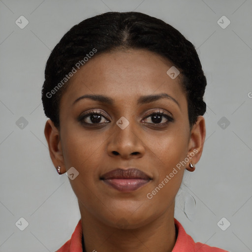 Joyful black young-adult female with short  brown hair and brown eyes