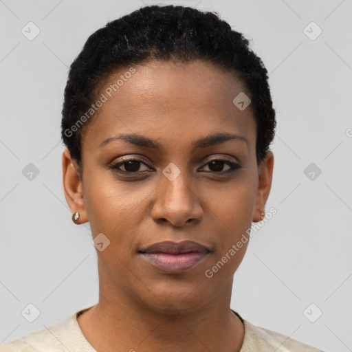 Joyful black young-adult female with short  black hair and brown eyes