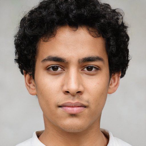 Neutral latino young-adult male with short  brown hair and brown eyes