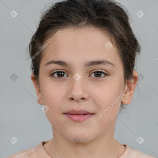 Joyful white child female with short  brown hair and brown eyes