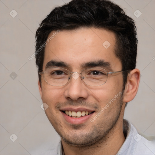 Joyful white adult male with short  black hair and brown eyes