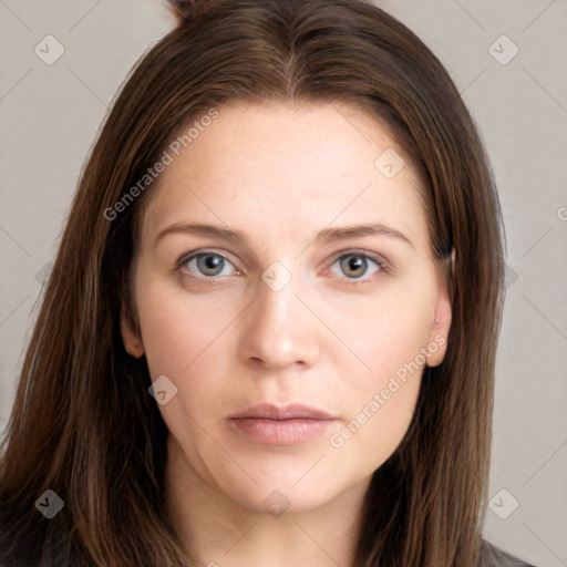 Neutral white young-adult female with long  brown hair and grey eyes