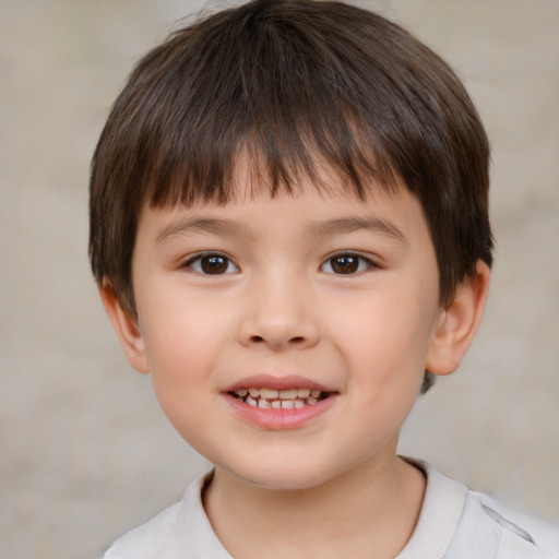 Joyful white child male with short  brown hair and brown eyes