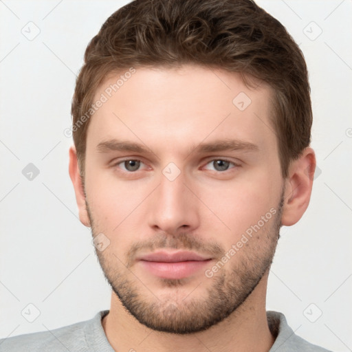 Neutral white young-adult male with short  brown hair and brown eyes