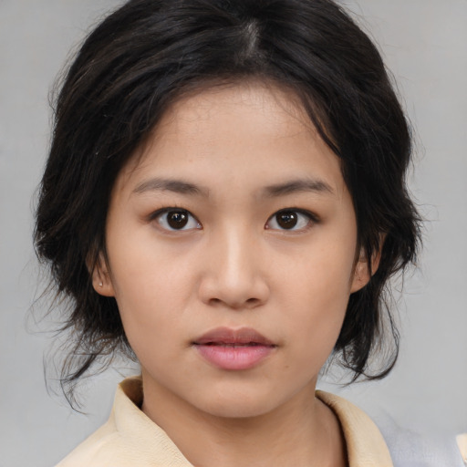 Neutral white young-adult female with medium  black hair and brown eyes