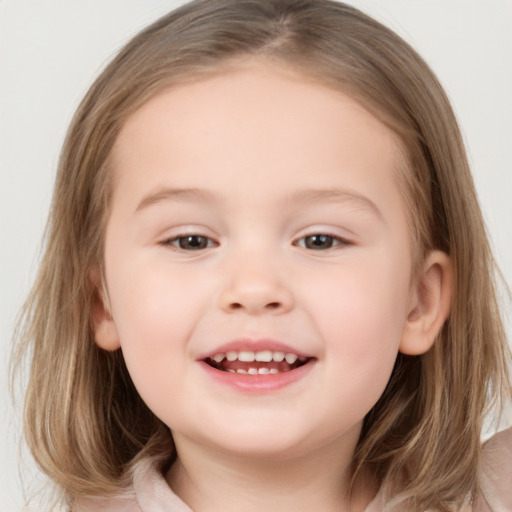 Joyful white child female with medium  brown hair and brown eyes