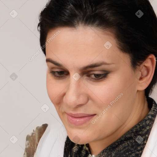 Joyful white adult female with medium  brown hair and brown eyes