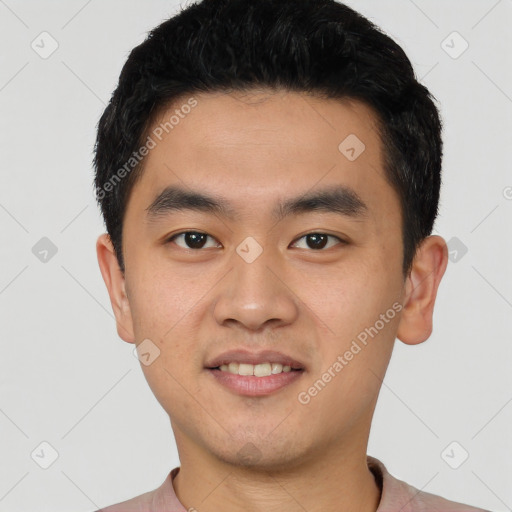 Joyful white young-adult male with short  black hair and brown eyes