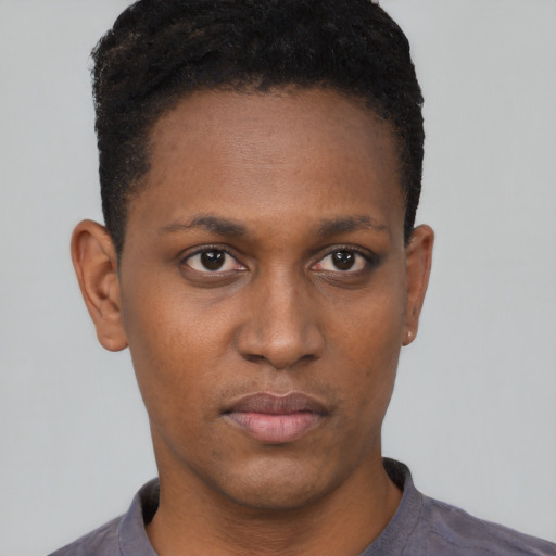 Neutral black young-adult female with short  black hair and brown eyes