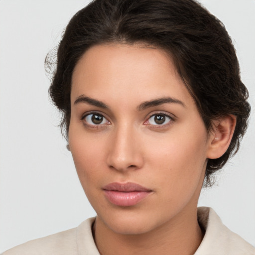 Neutral white young-adult female with medium  brown hair and brown eyes