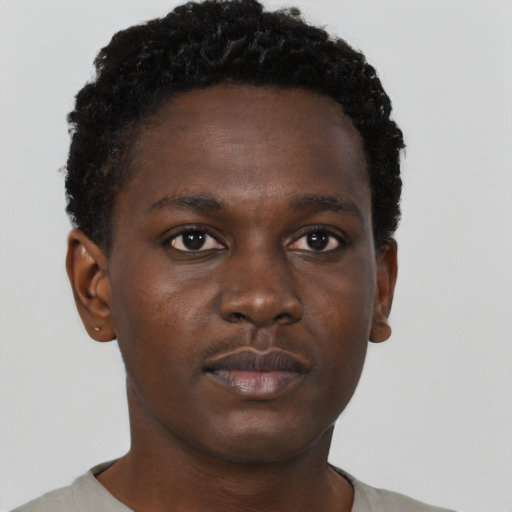 Neutral black young-adult male with short  brown hair and brown eyes