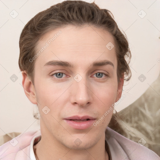 Neutral white young-adult male with short  brown hair and grey eyes