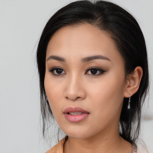 Neutral asian young-adult female with long  black hair and brown eyes