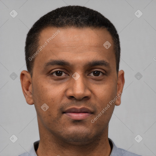 Neutral latino young-adult male with short  brown hair and brown eyes