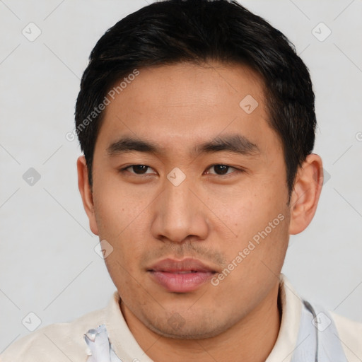 Neutral asian young-adult male with short  brown hair and brown eyes