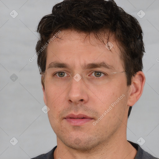 Neutral white adult male with short  brown hair and brown eyes