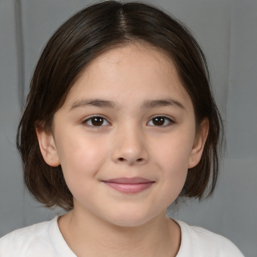 Joyful white child female with medium  brown hair and brown eyes