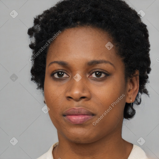 Neutral black young-adult female with short  black hair and brown eyes