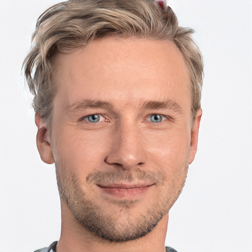 Joyful white adult male with short  brown hair and grey eyes