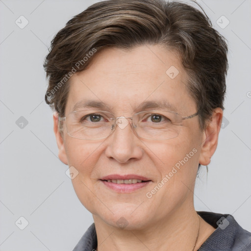 Joyful white adult female with short  brown hair and grey eyes