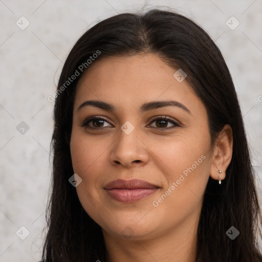 Joyful latino young-adult female with long  brown hair and brown eyes