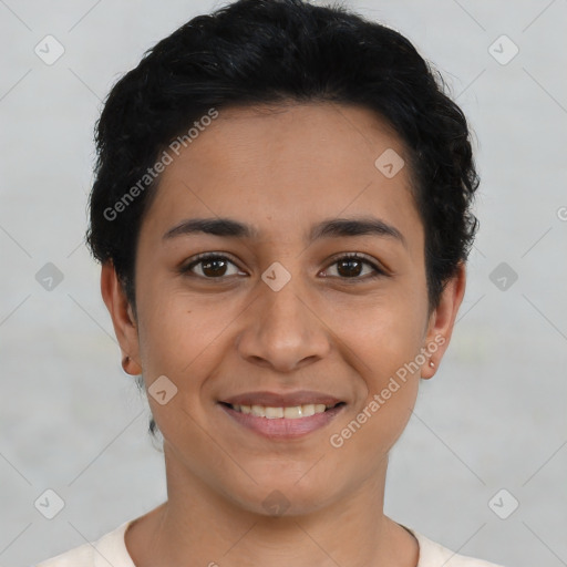 Joyful latino young-adult female with short  black hair and brown eyes