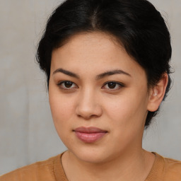 Joyful asian young-adult female with short  brown hair and brown eyes