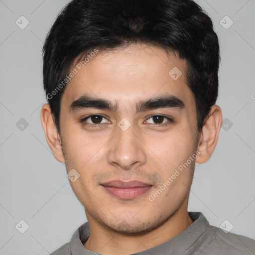 Joyful white young-adult male with short  black hair and brown eyes