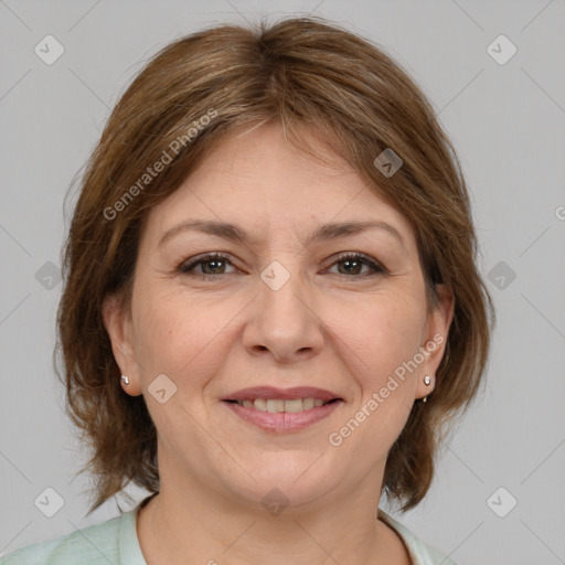 Joyful white adult female with medium  brown hair and brown eyes