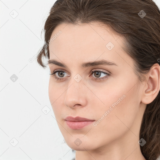 Neutral white young-adult female with medium  brown hair and grey eyes