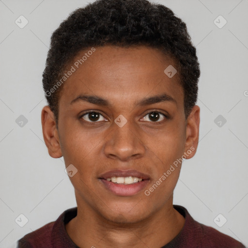 Joyful black young-adult male with short  brown hair and brown eyes