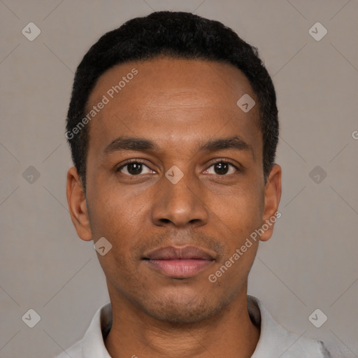 Neutral latino young-adult male with short  black hair and brown eyes