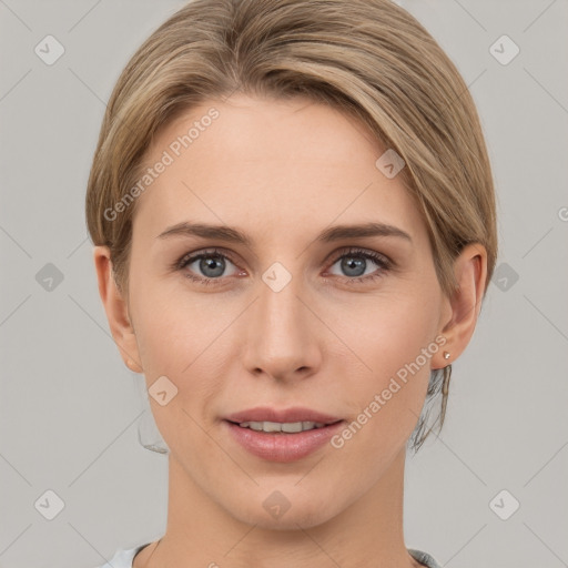 Joyful white young-adult female with short  brown hair and grey eyes