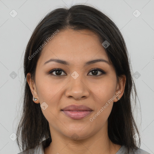 Joyful latino young-adult female with long  brown hair and brown eyes