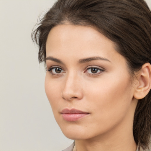 Neutral white young-adult female with medium  brown hair and brown eyes