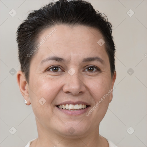 Joyful white adult female with short  brown hair and brown eyes