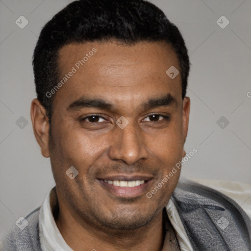 Joyful latino young-adult male with short  brown hair and brown eyes