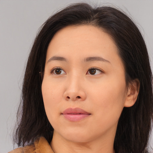Neutral asian young-adult female with long  brown hair and brown eyes