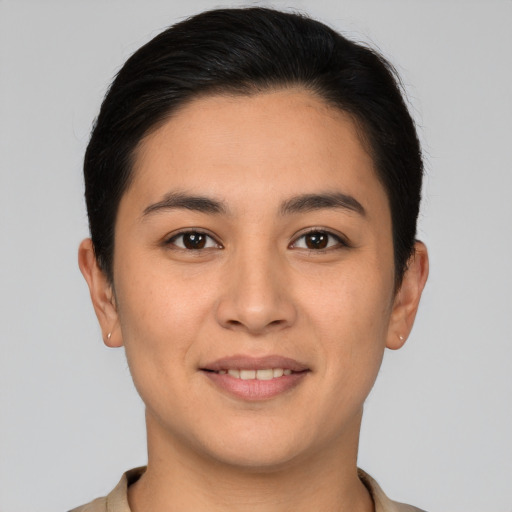 Joyful white young-adult female with short  brown hair and brown eyes