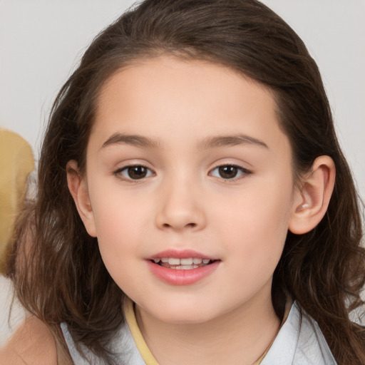 Joyful white child female with medium  brown hair and brown eyes