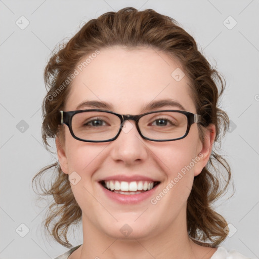 Joyful white young-adult female with medium  brown hair and blue eyes