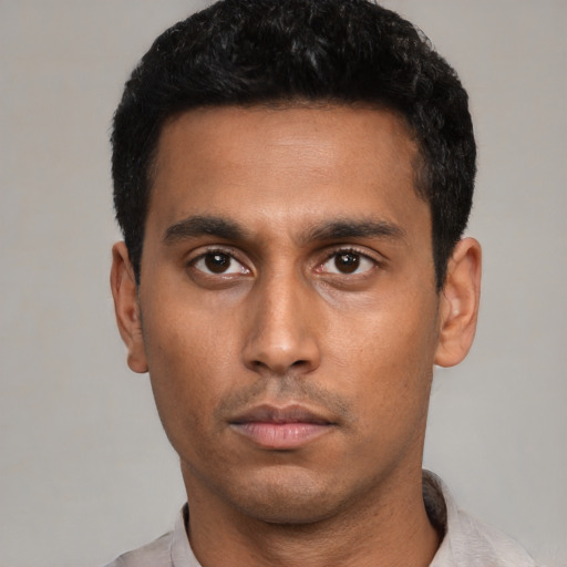 Neutral latino young-adult male with short  black hair and brown eyes