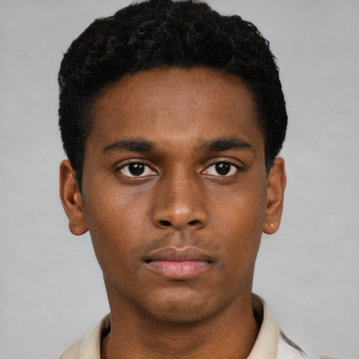 Neutral black young-adult male with short  brown hair and brown eyes
