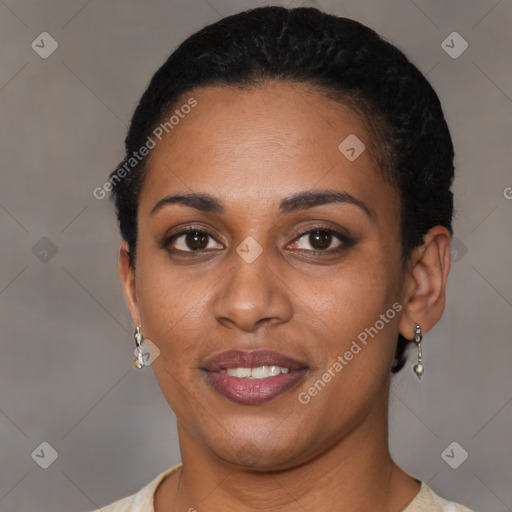 Joyful black young-adult female with short  brown hair and brown eyes