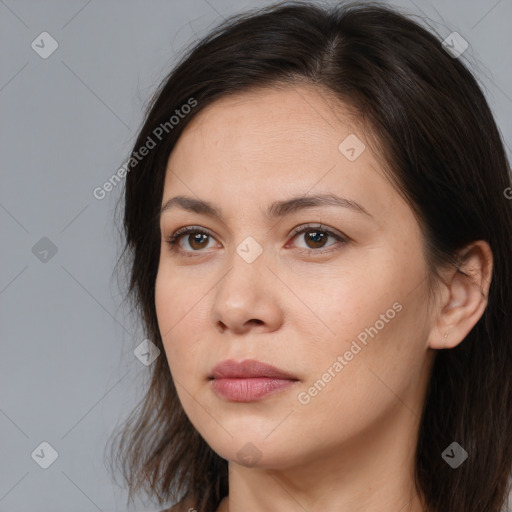 Neutral white young-adult female with long  brown hair and brown eyes