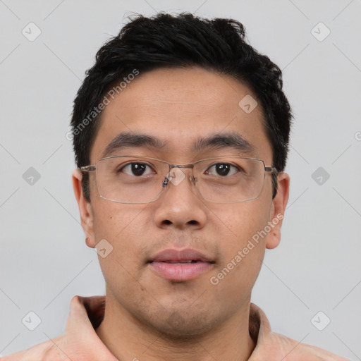 Neutral asian young-adult male with short  black hair and brown eyes