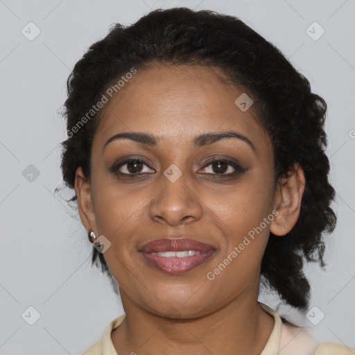 Joyful black young-adult female with short  black hair and brown eyes