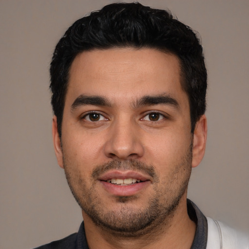 Neutral white young-adult male with short  black hair and brown eyes