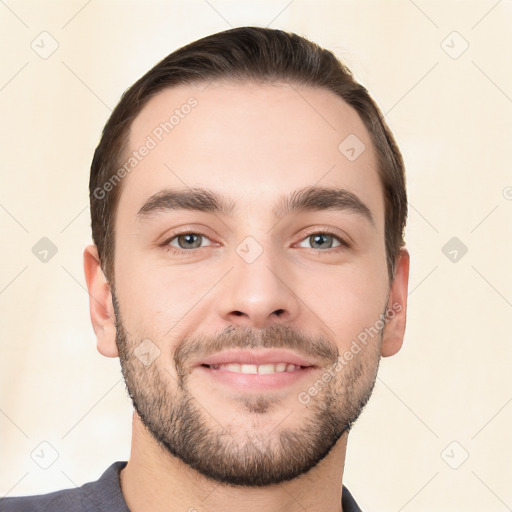 Joyful white young-adult male with short  brown hair and brown eyes